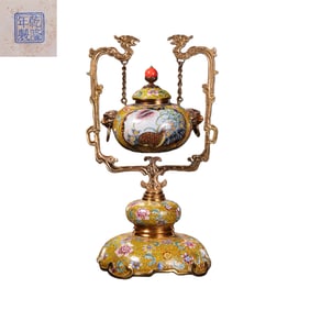 Chinese enamel-painted covered jar with floral and bird design from the Qianlong period of the Qing