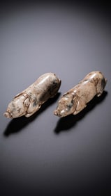 A pair of Chinese Han Dynasty jade pig hands