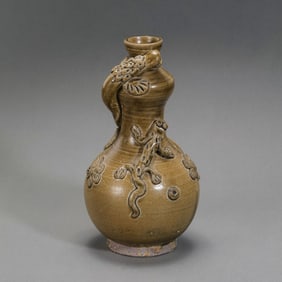Celadon gourd-shaped bottle with applied decoration from the Northern and Southern Dynasties period