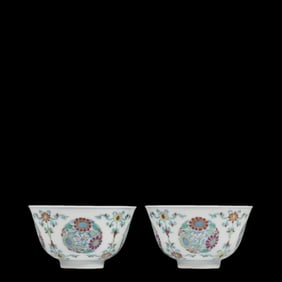 A pair of Chinese doucai (enamel overglaze) floral-patterned cups from the Yongzheng period of the