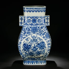 Blue and white porcelain vase with floral design and loop handles, from the Qianlong period of the