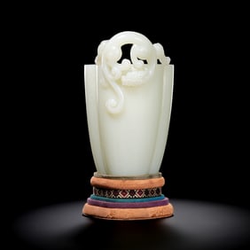Chinese Qing Dynasty Hetian white jade melon-shaped cup with dragon design