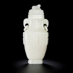 Chinese Qing Dynasty Hetian white jade vase with animal mask design and double ring handles