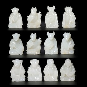 A set of twelve Chinese zodiac animals made of Hetian white jade from the Qing Dynasty.