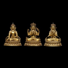 A set of gilt bronze seated Buddha statues inlaid with gemstones from the Qianlong period of the