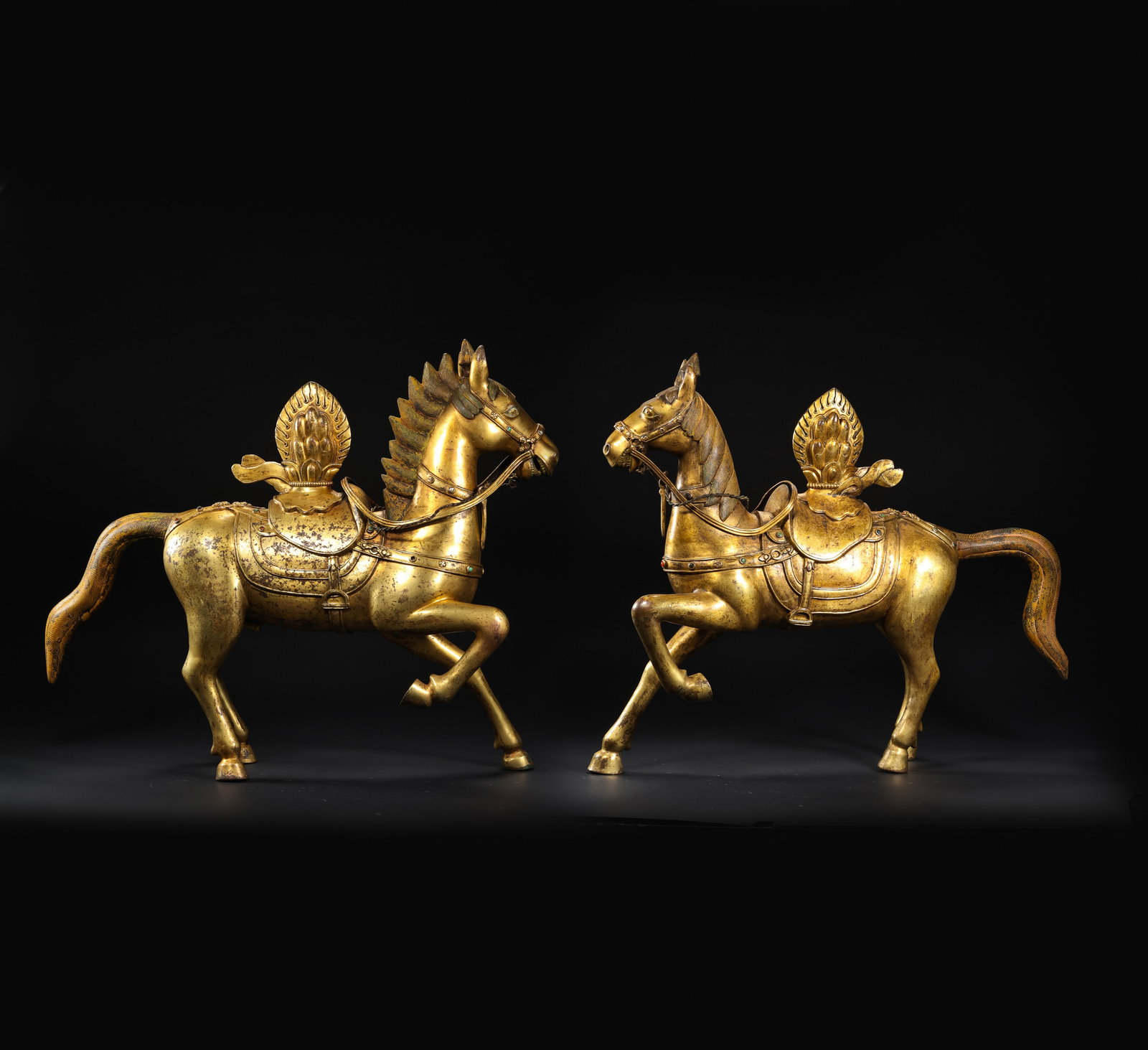 A pair of Chinese gilt bronze Buddhist galloping horses (1 of 14)