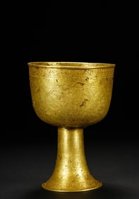 A pure gold dragon-patterned stem cup from the Yuan Dynasty of China