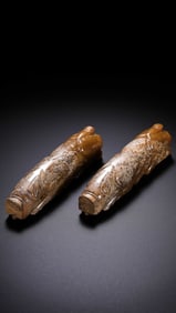A pair of Chinese Han Dynasty jade pig hands
