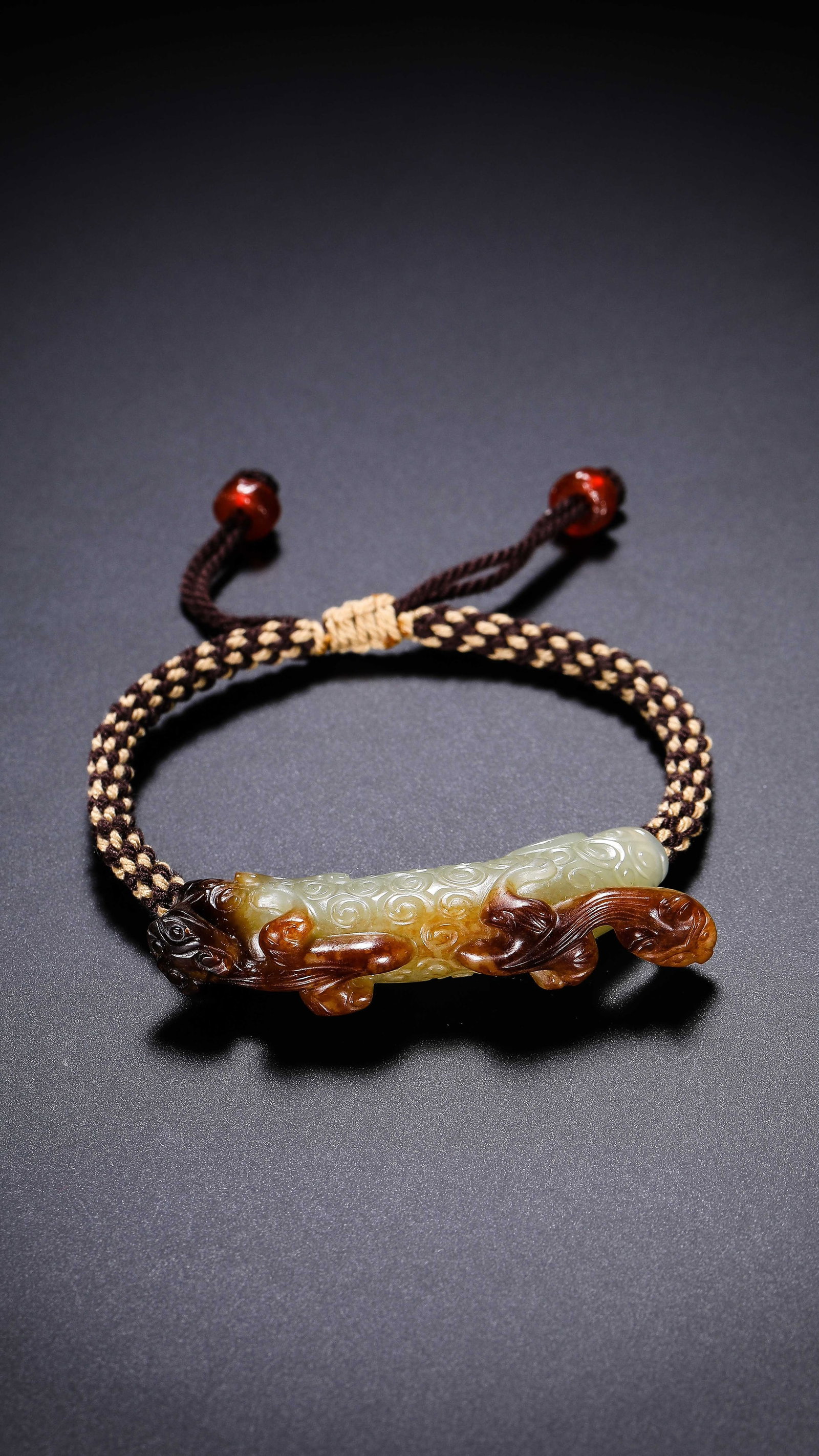Chinese Han Dynasty Jade Dragon Bracelet: L. 6.4 cm. W. 2.1 cm. Weight. 26 gram.
