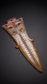 Jade artifacts with animal mask motifs from the Warring States and Han Dynasties in China