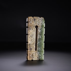 A square jade pendant with cloud pattern from the Warring States period of China