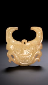Jade pendant with animal mask design from the Western Zhou Dynasty in China