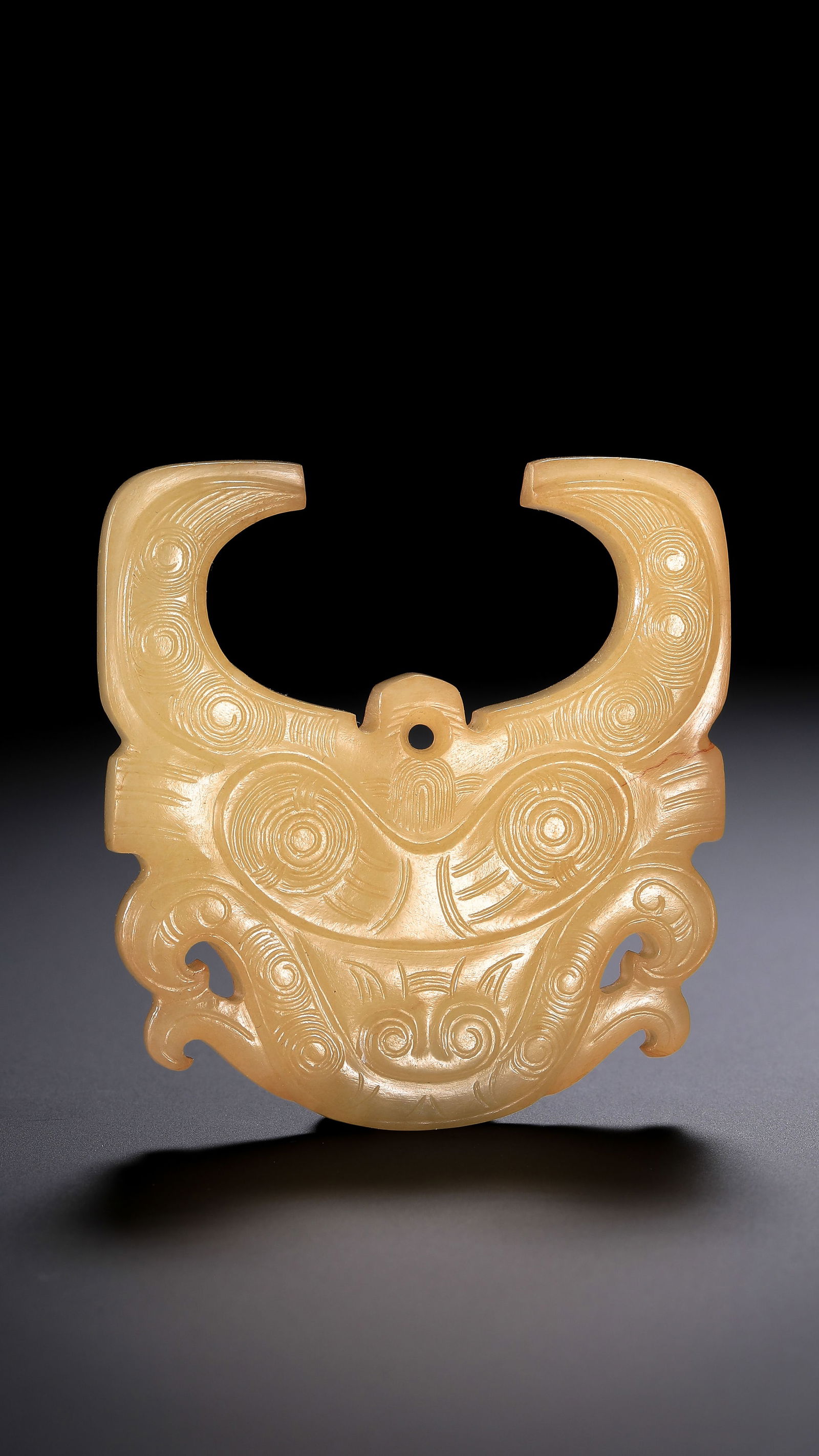 Jade pendant with animal mask design from the Western Zhou Dynasty in China (1 of 13)