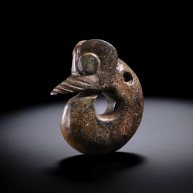 Chicken-bone white jade pig dragon from the Hongshan Culture of the Neolithic period in China