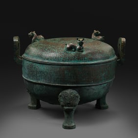 A three-legged covered ding vessel inlaid with gold and silver from the Warring States period of