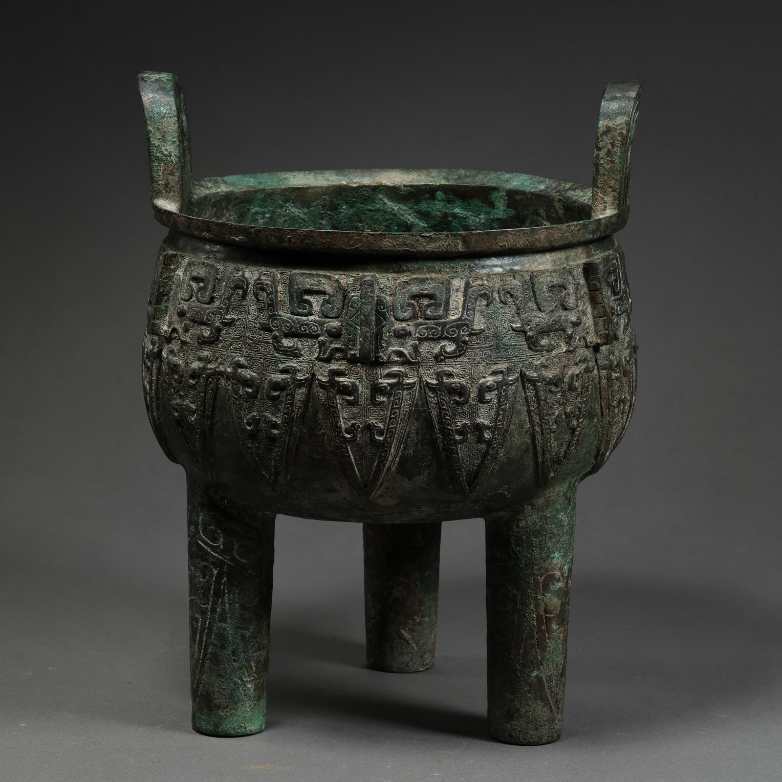 Chinese Shang and Zhou Dynasty bronze three-legged double-eared censer (1 of 11)