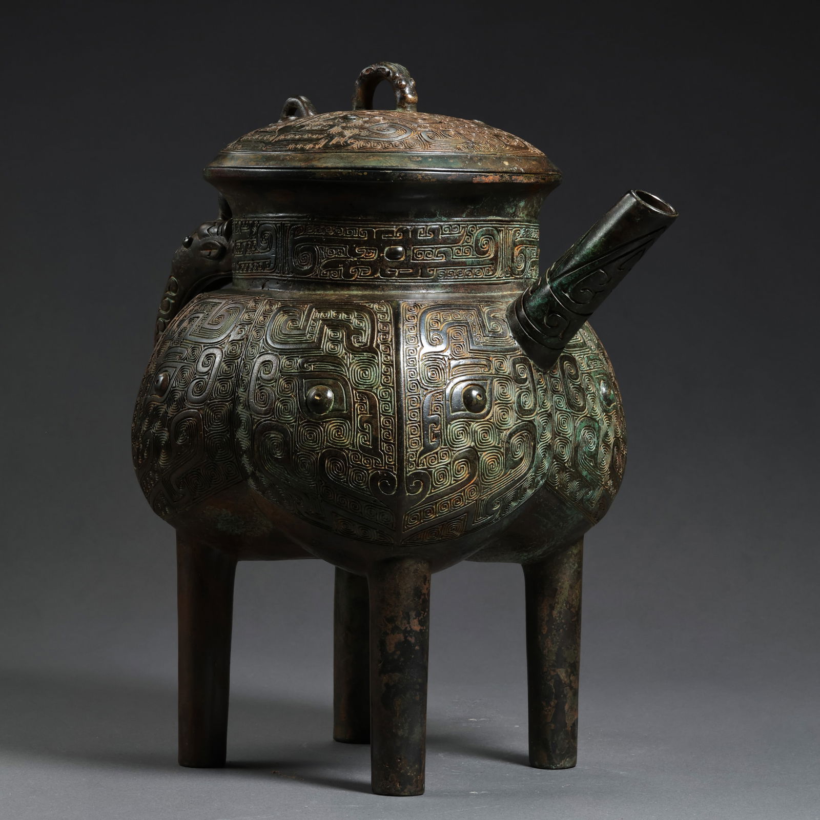 Bronze pot with animal mask design from the Shang and Zhou Dynasties in China (1 of 16)