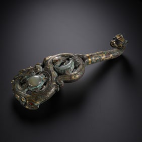 Gold and silver inlaid belt hooks from the Warring States period in China