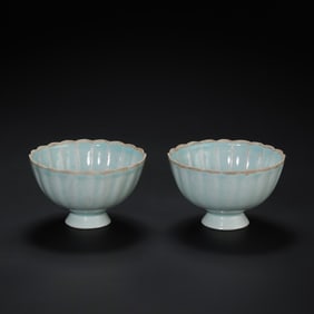 A pair of celadon flower-shaped tea bowls from the Hutian kiln of the Southern Song Dynasty in China