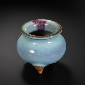 A three-legged censer with sky-blue glaze and red trim from the Jun kiln of the Northern Song