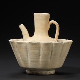 A set of Cizhou ware white-glazed flower-shaped wine warmers from the late Tang and Five Dynasties