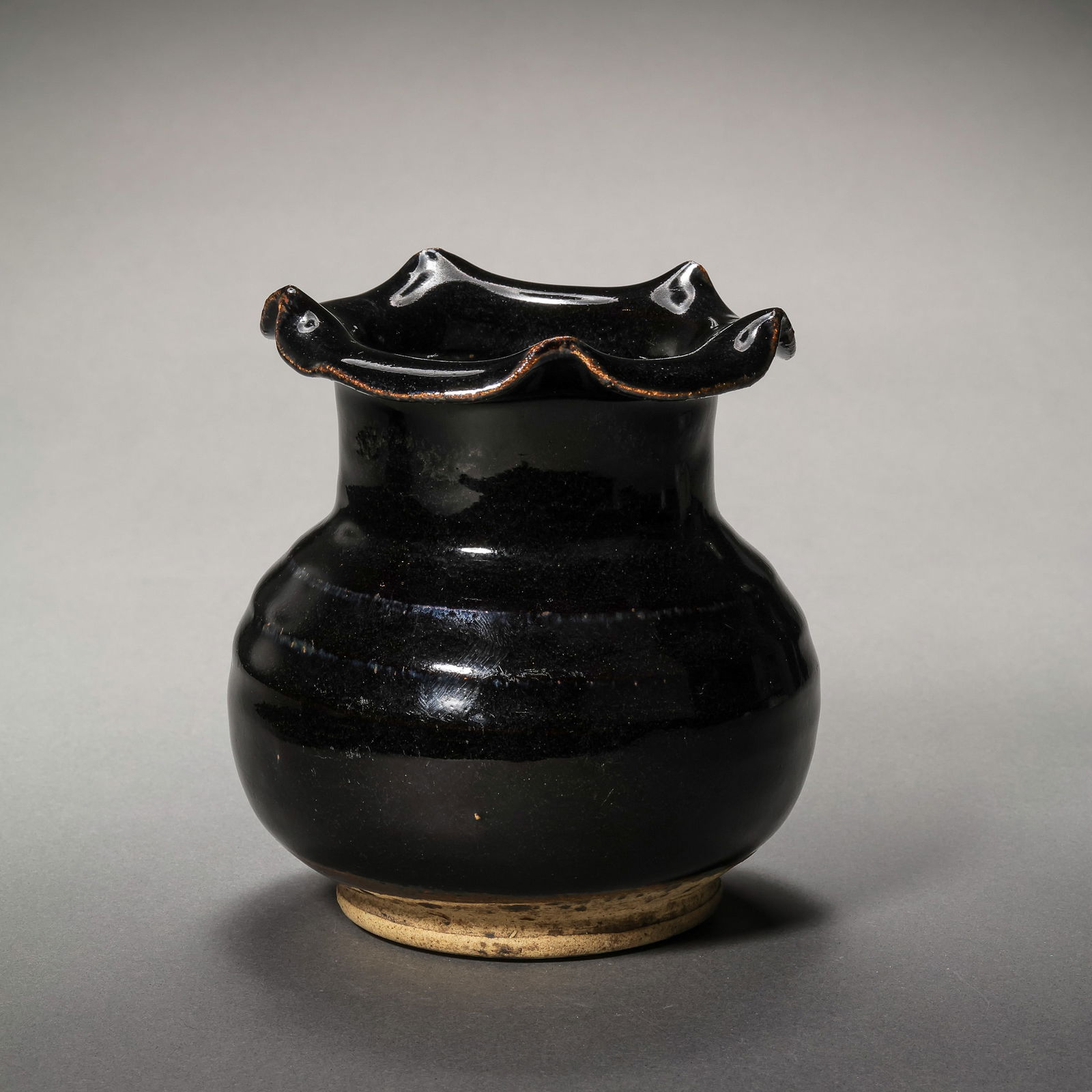 Northern Song Dynasty Cizhou Kiln Black Glazed Flower-Shaped Spittoon: H. 12.5 cm. W. 10.5 cm.