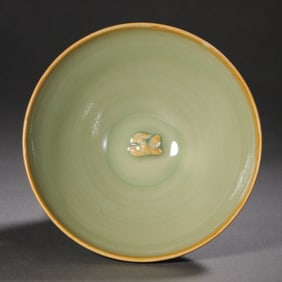 A celadon bowl with lotus petal design from the Yaozhou kiln during the late Tang and Five Dynasties