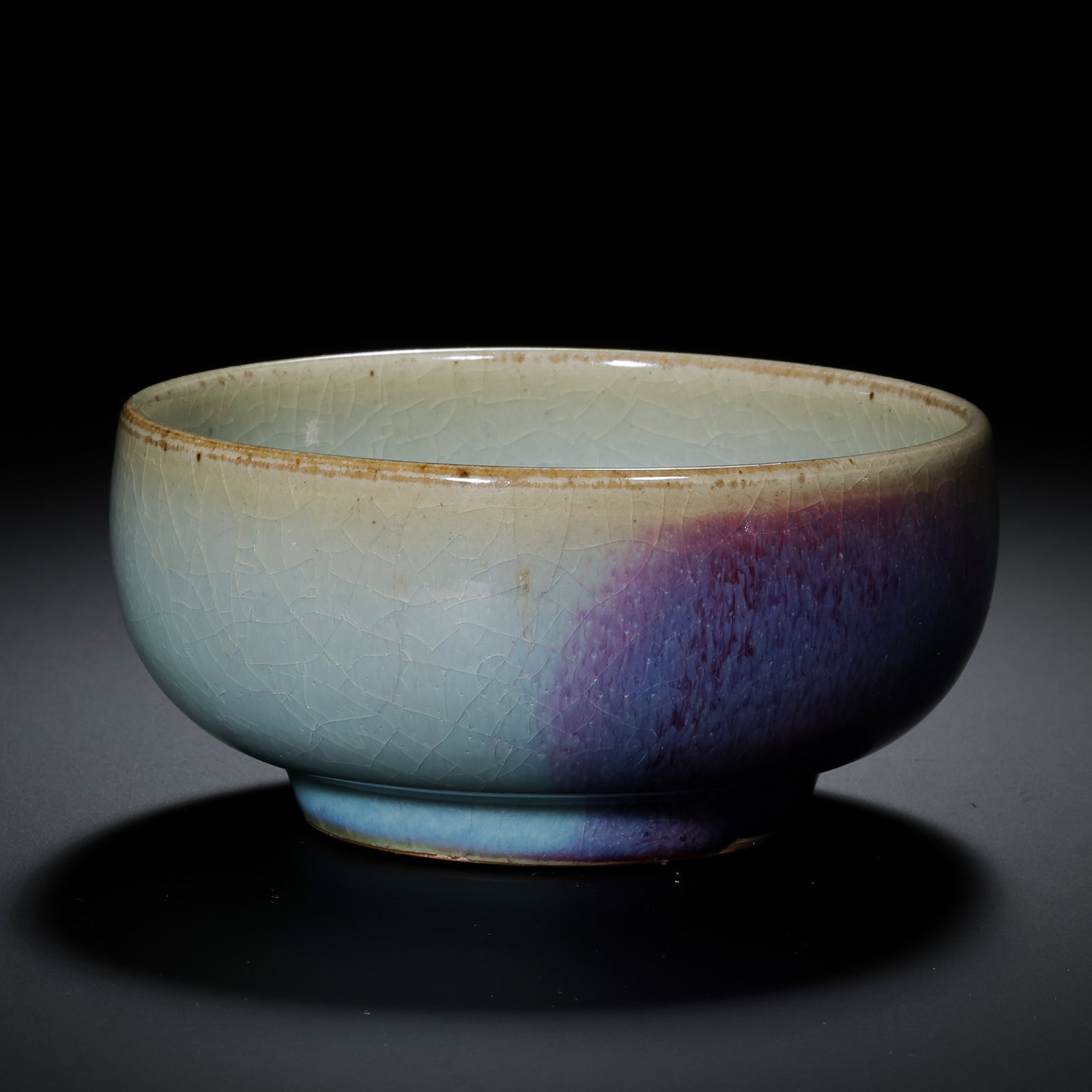 A Northern Song Dynasty Jun ware sky-blue glazed Luohan bowl with red glaze.: H. 4.6 cm. Diam. 10 cm.