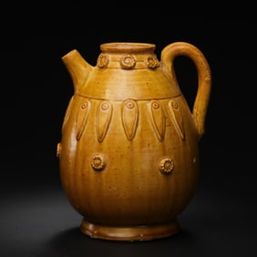 Yellow-glazed ewer with applied decoration from the Tang Dynasty, China