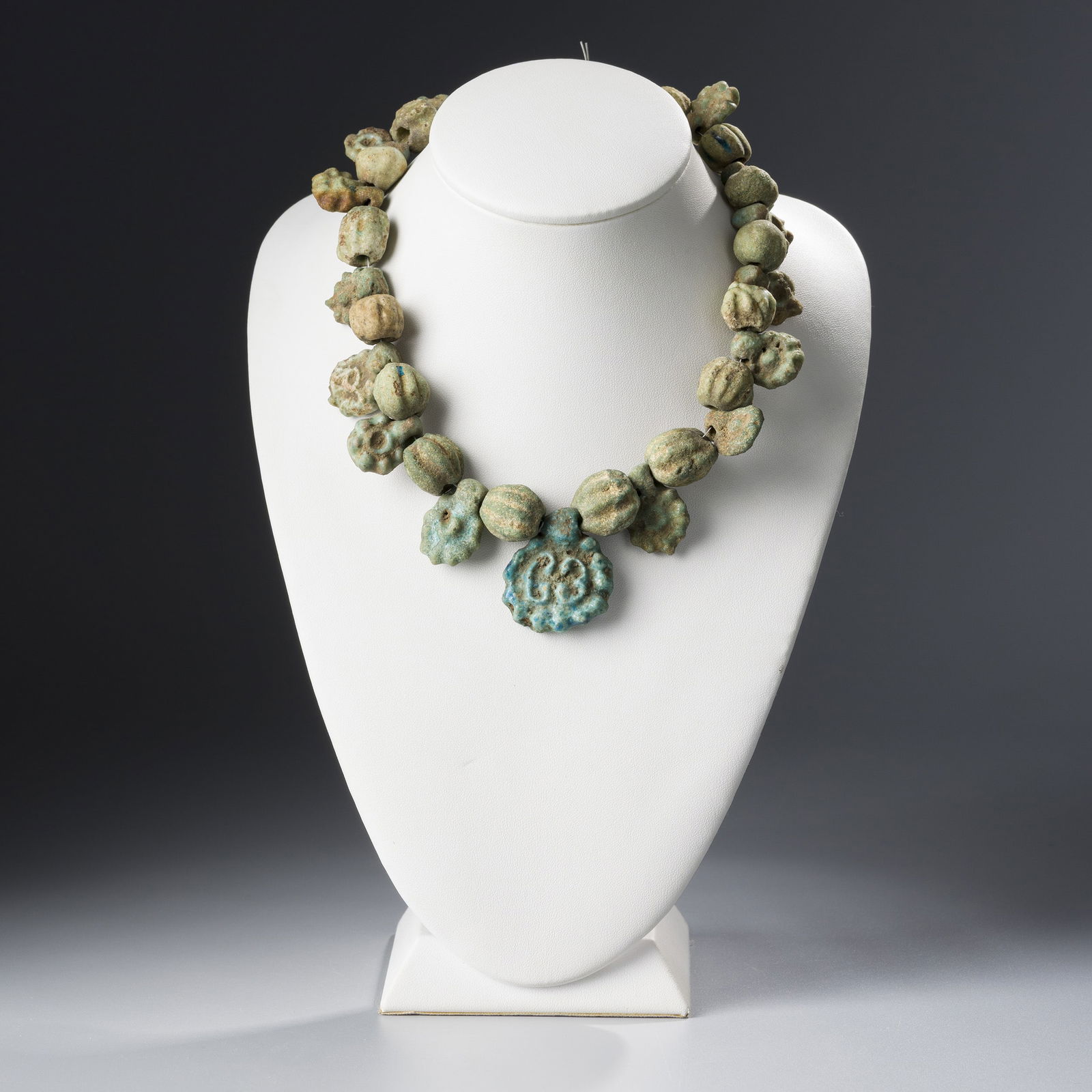 LOT OF ANCIENT EGYPTIAN FAIENCE BEADS [35PCS, 102GRAM]: Lot of Ancient Egyptian Faience Beads [35pcs, 102gram]*If you win the item, we will provide customized packaging tailored specifically for your goods. If you have any specific requests, please do not