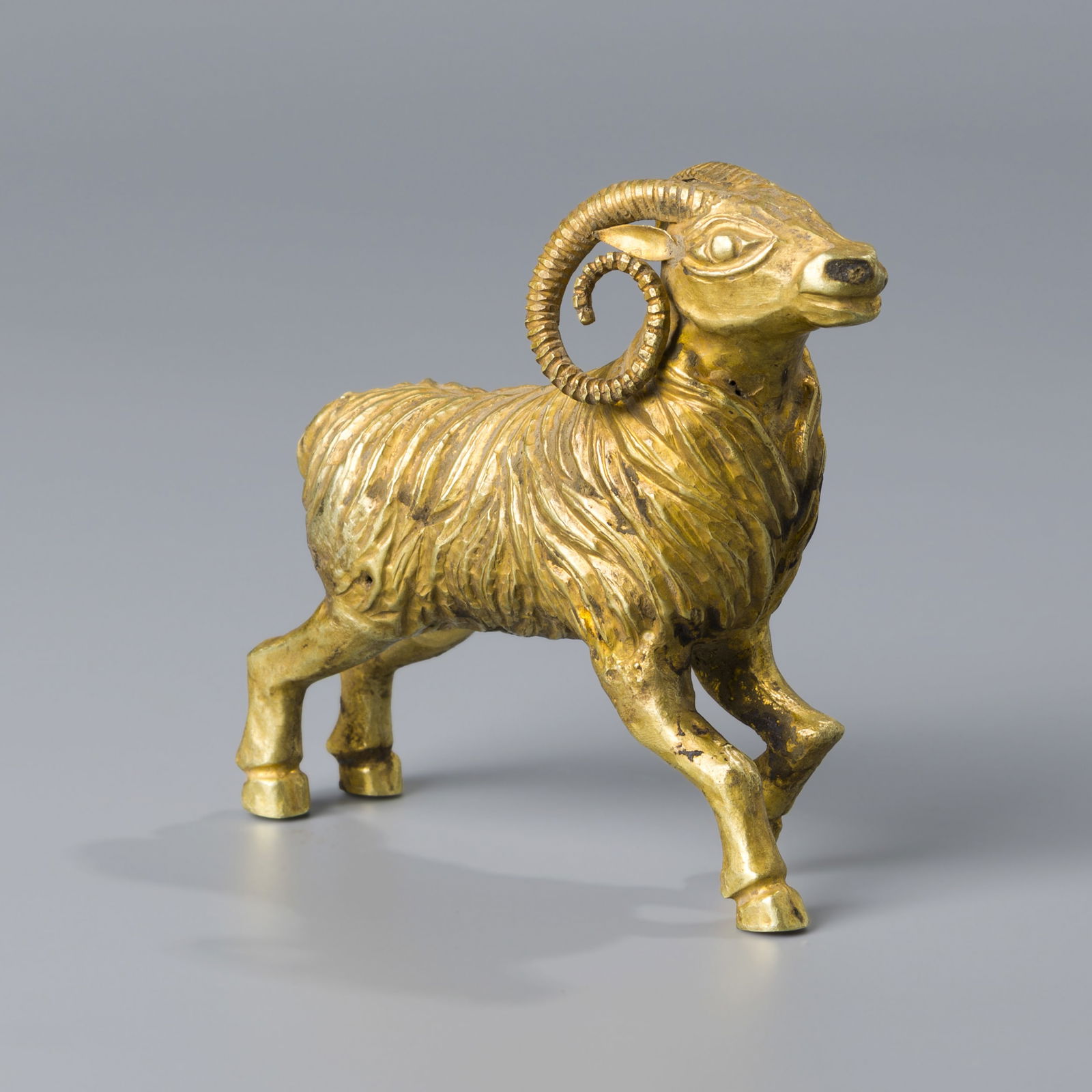 ANCIENT BACTRIAN GOLD WALKING RAM FIGURINE: Ancient Bactrian Gold walking Ram Figurine [9 x 8.5cm, 65gram]*If you win the item, we will provide customized packaging tailored specifically for your goods. If you have any specific requests, please