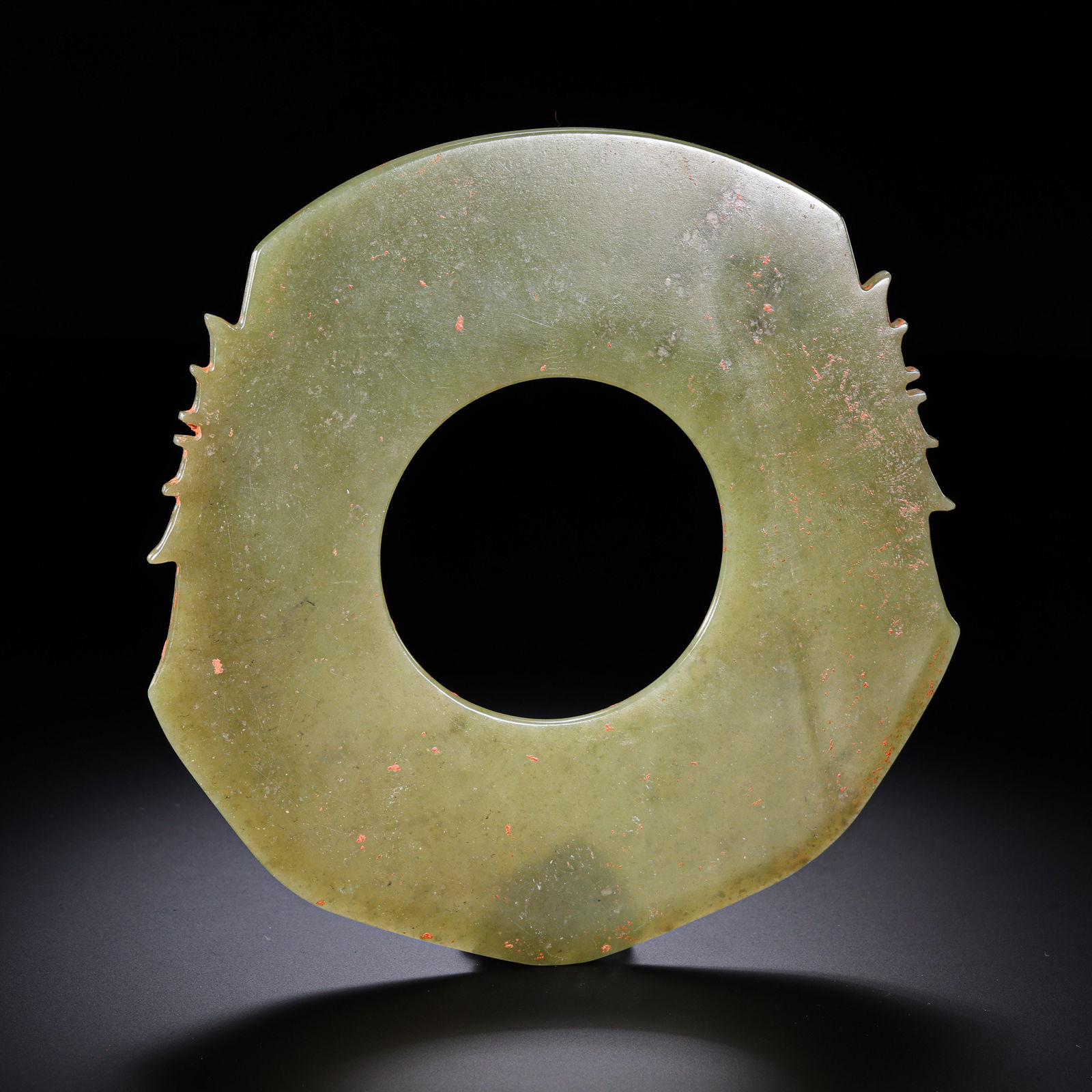 A RARE AND IMPORTANT CELADON-YELLOW JADE CEREMONIAL AXE,YUELATE NEOLITHIC PERIOD TO EARLY WESTERN: Description This monumental ritual object is fashioned from a substantial slab of celadon-yellow nephrite jade, exhibiting a rich, unctuous surface and a semi-translucent quality. The stone displays c