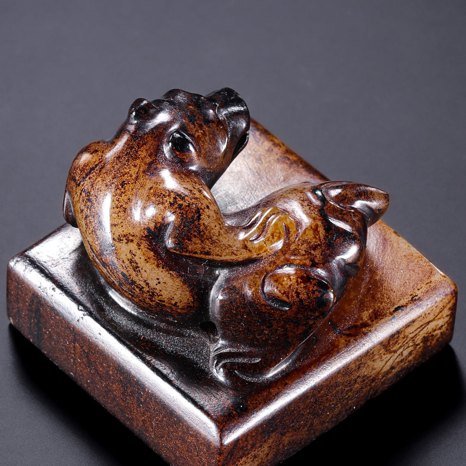 A RARE AND EXQUISITE WHITE JADE 'MYTHICAL BEAST' SEALWARRING STATES PERIOD TO HAN DYNASTY (C. 3RD: Description This rare personal seal is masterfully carved from a single block of Hetian white jade, possessing an unctuous, mutton-fat luster. The stone is distinguished by a profound and rhythmic rus