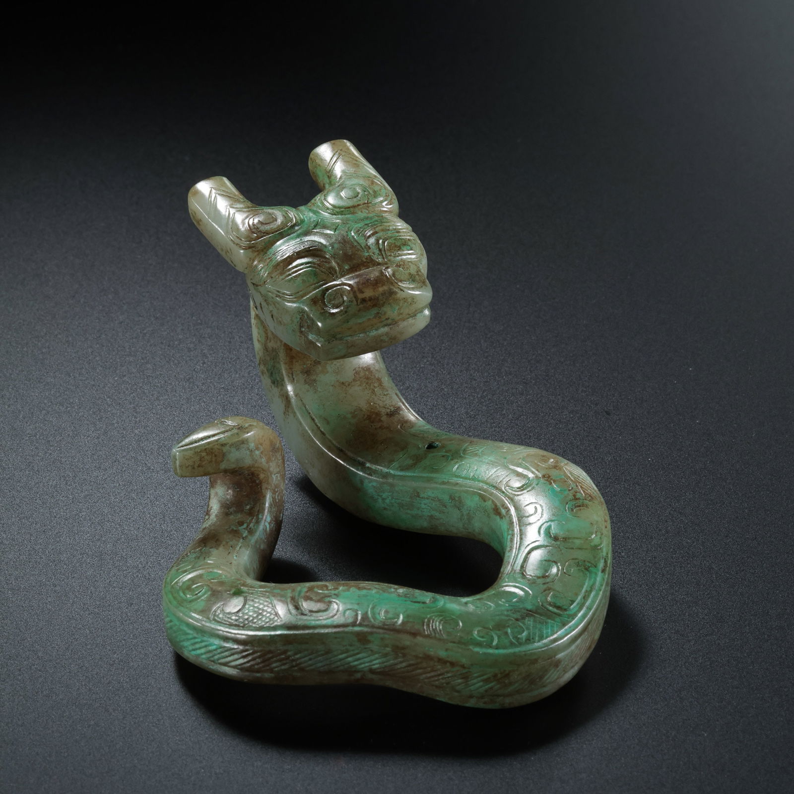 A.D.1-3JADE DRAGON-PATTERNED PENDANT FROM HETIAN DURING THE HAN DYNASTY, 16TH CENTURY.: H. 15.2 cm. L. 8 cm. Weight. 103 gram.*If you win the item, we will provide customized packaging tailored specifically for your goods. If you have any specific requests, please do not hesitate to cont