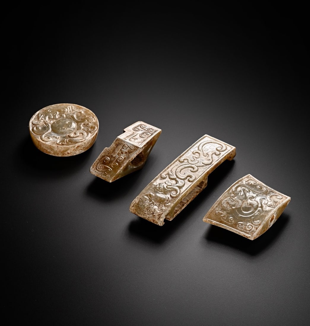 A RARE AND COMPLETE SET OF FOUR WHITE JADE 'SWORD FITTINGS' WARRING STATES TO HAN DYNASTY (4TH (1 of 13)