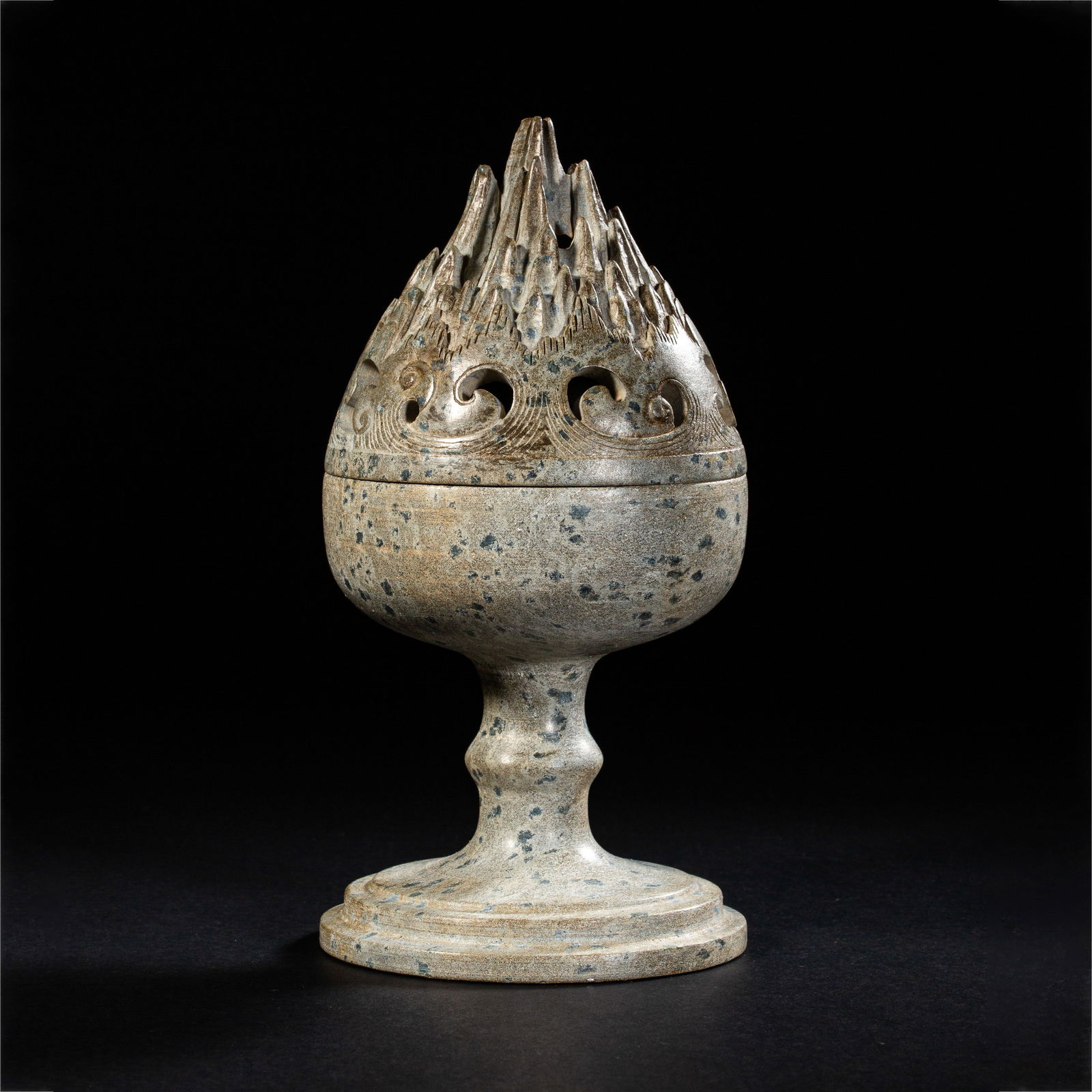 RARE AND MAGNIFICENT 'LEOPARD-SKIN' STONE 'BOSHAN' HILL CENSERTANG DYNASTY (618-907): DescriptionThe censer is masterfully carved from a single block of highly prized leopard-skin stone, a type of limestone or marble characterized by its dramatic, natural concentric 'spots' in shades o