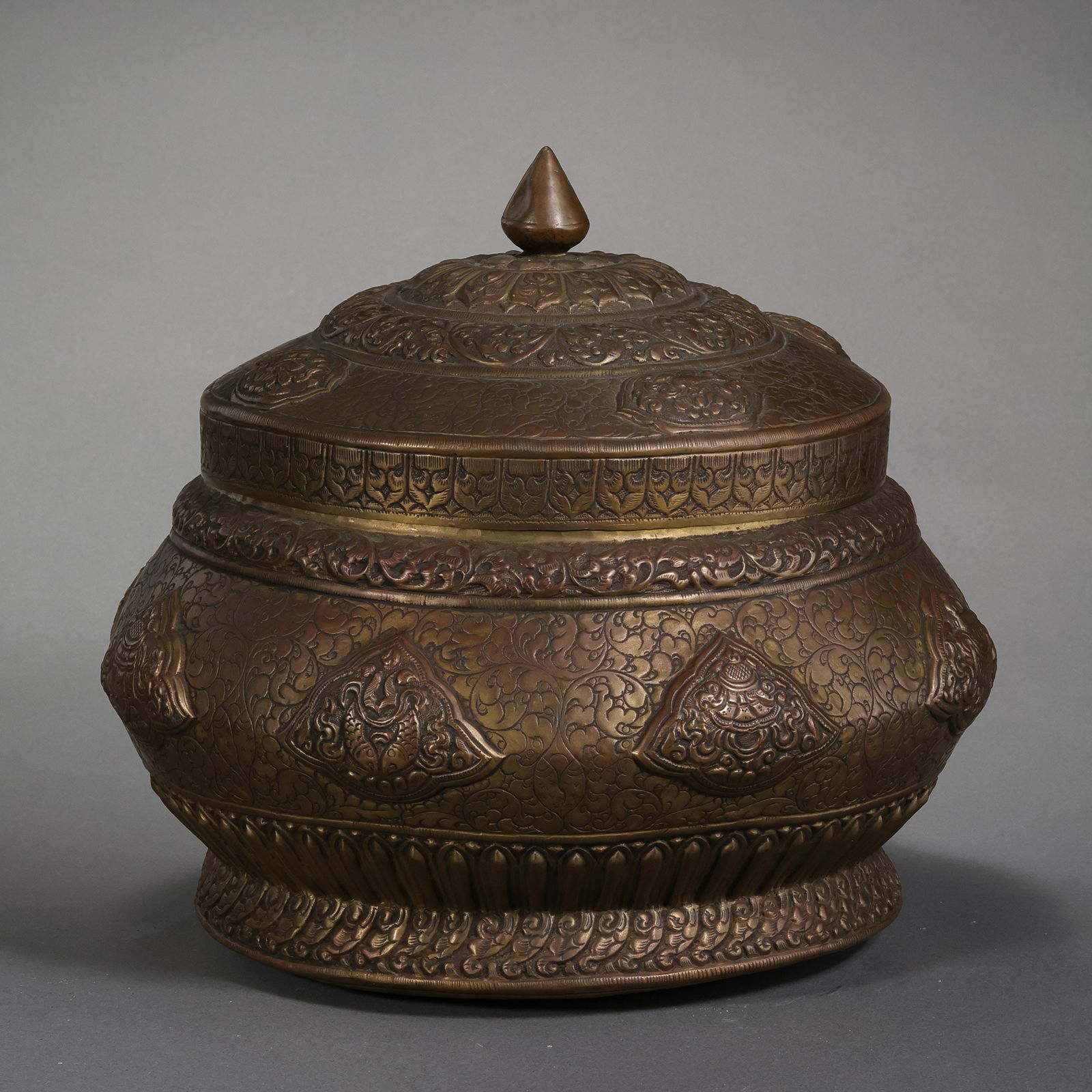 A RARE AND MAGNIFICENT ALLOY COPPER REPOUSSÉ 'EIGHT AUSPICIOUS SYMBOLS' OFFERING JAR AND (1 of 10)