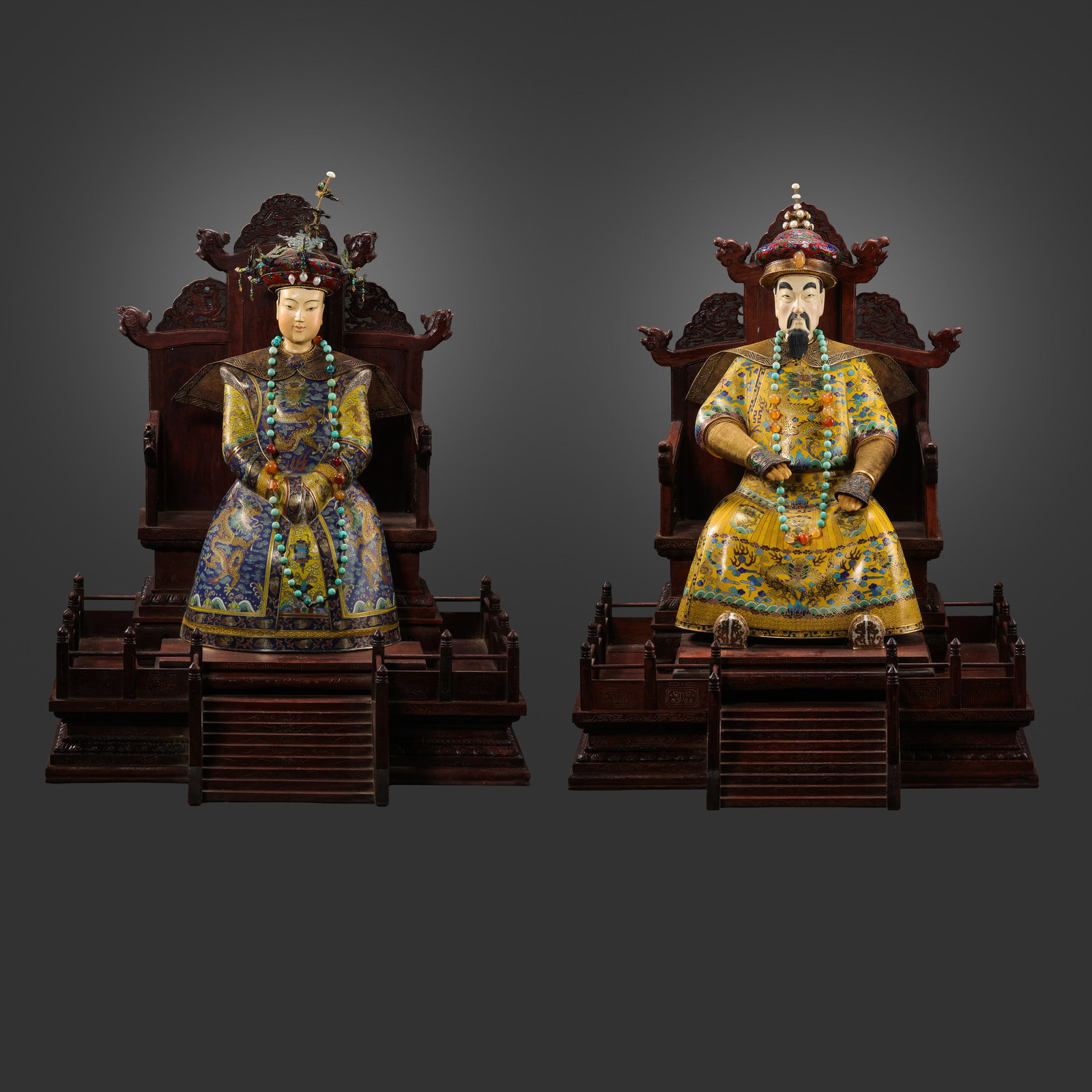 A set of seated porcelain emperors and empresses from the Qing Dynasty of China (1 of 20)