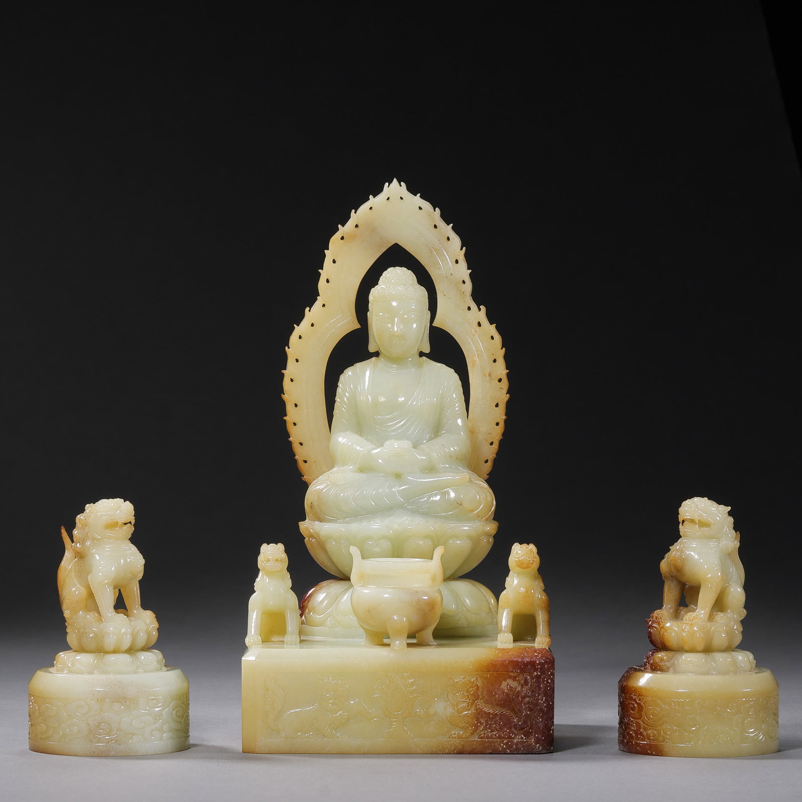 A set of seated Buddha statues made of Hetian white jade from the Qing Dynasty, China: H . 22 cm . W . 10 cm . Weight 2340 gram . H . 22 cm .