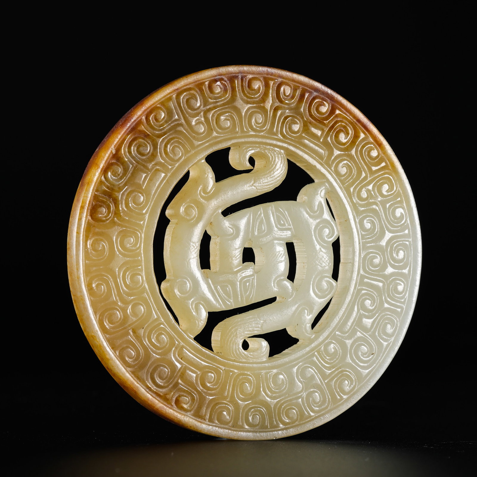 Jade disc from the Han Dynasty in China: H. 6 cm . Weight 30 gram .