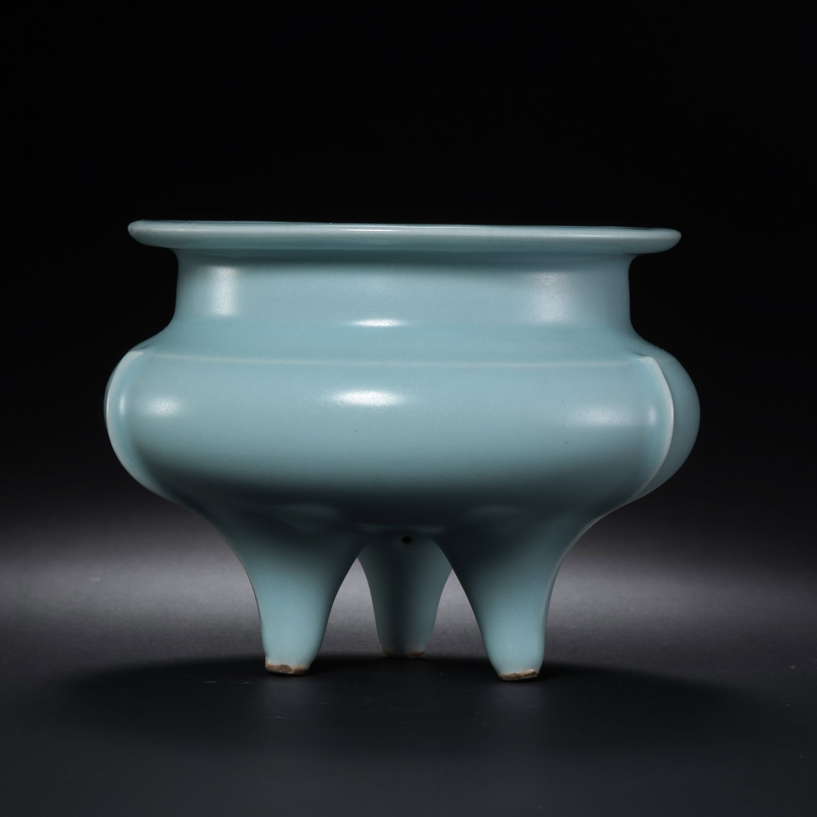 Celadon-glazed tripod incense burner from Longquan kiln, Southern Song Dynasty, China: H. 8 cm. W. 10 cm.
