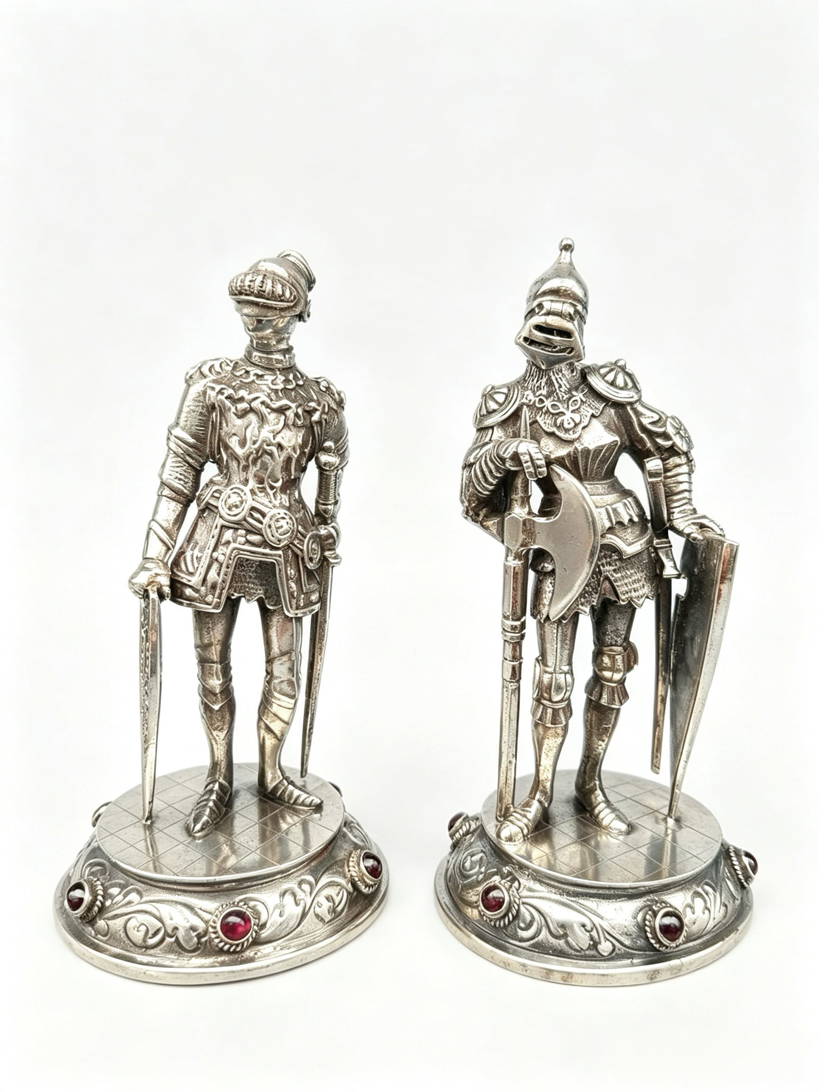 Pair of Solid Silver Full-Round Knight Sculptures, German, Circa 1920: Date RecommendationCirca 1920, entirely handcrafted via lost-wax casting and hand chasing by local German silversmith ateliersWeight & DimensionsTotal net weight of the full set: 356 gramsOverall heig