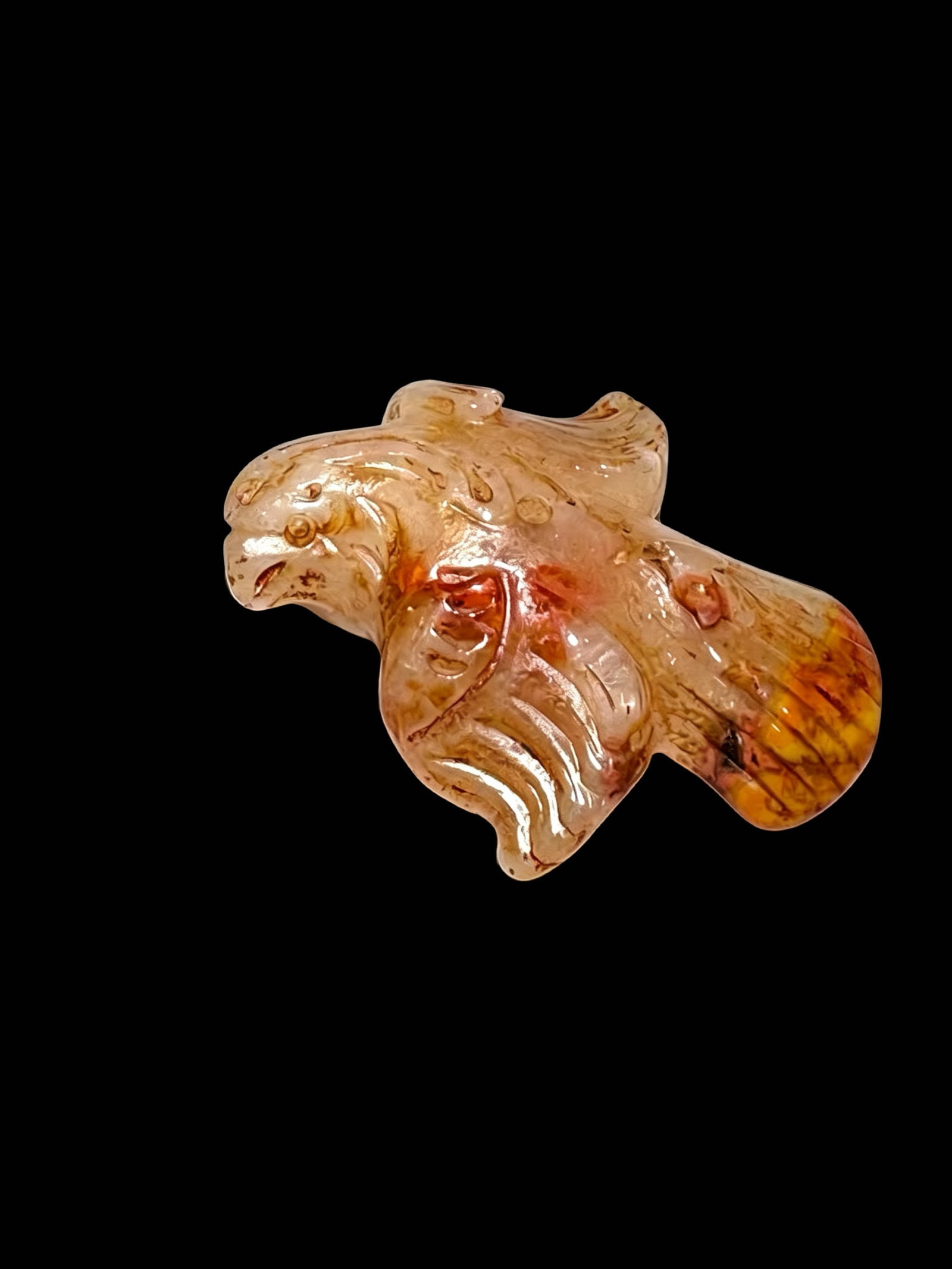 Warring States Red Agate Divine Bird Pendant: Proposed Period: Warring States to Han DynastyDimensions: Length 4.8 cm (1.89 in);Material: Natural translucent white crystalline base Warring States red agate. The tail retains natural yellow-brown