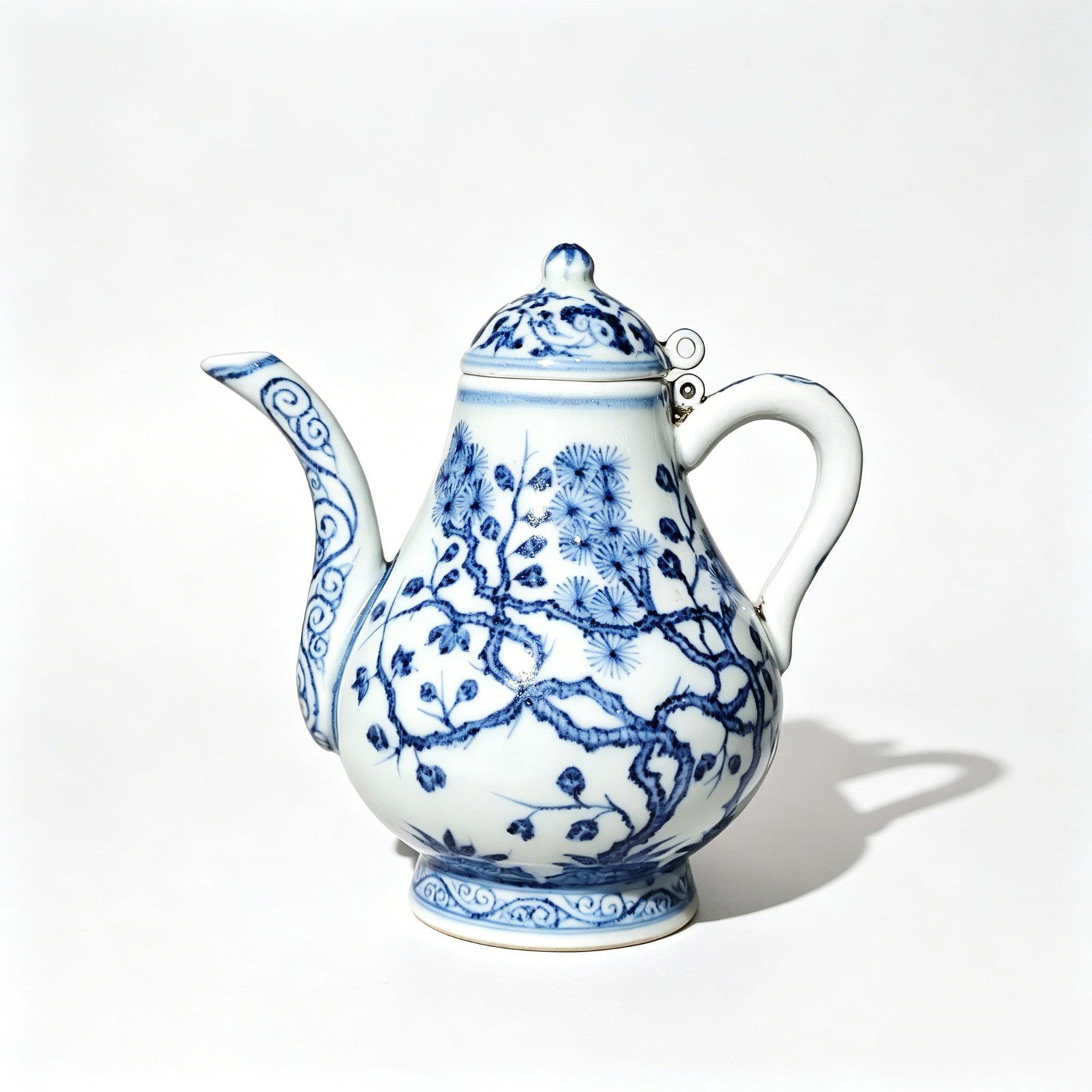 Pear-Shaped Ewer Decorated with Pine, Bamboo and Plum Blossoms in Underglaze Blue: Pear-Shaped Ewer Decorated with Pine, Bamboo and Plum Blossoms in Underglaze BlueBasic InformationMark: Six-character regular script mark "Made in the Xuande Reign of the Great Ming Dynasty" enclosed 