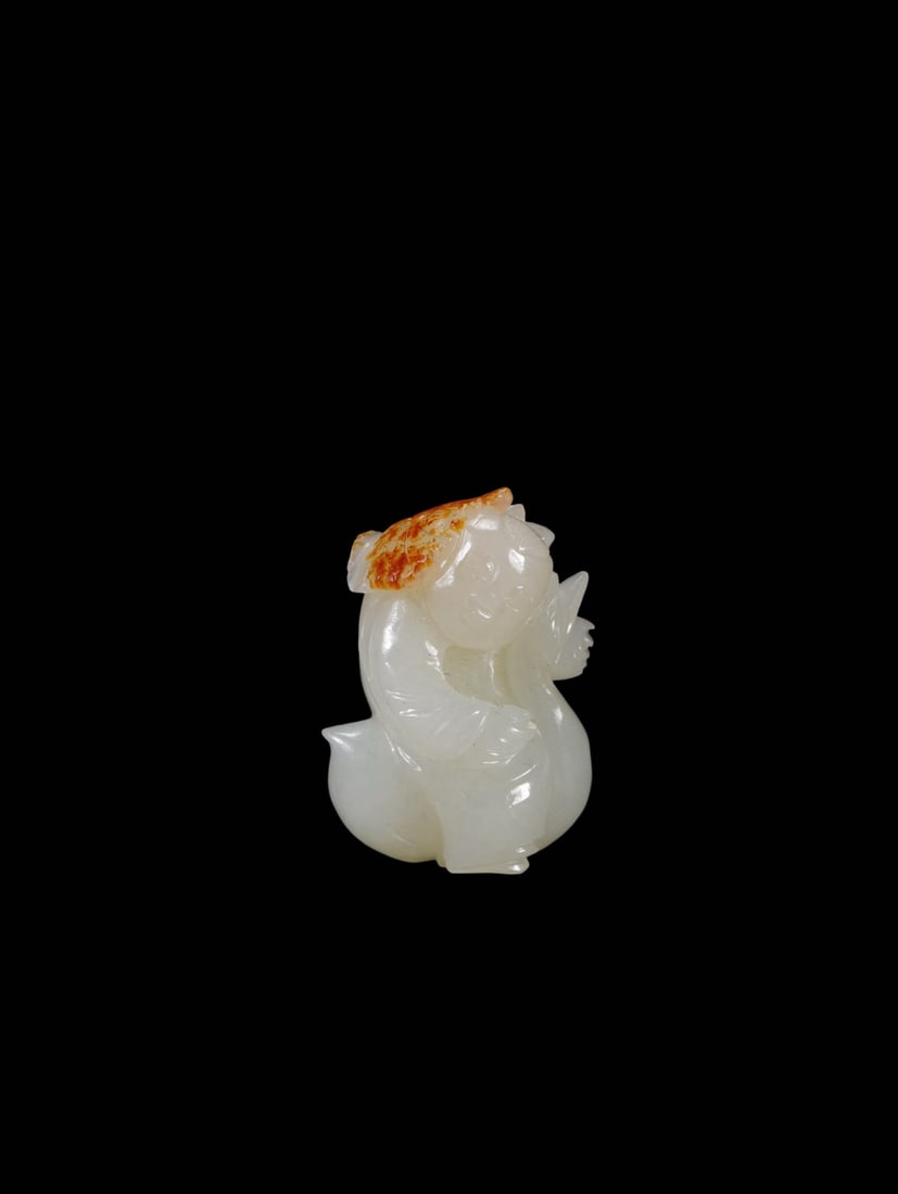 Mid-Qing Period White Hetian Jade Ornament of Boy Holding Lotus Cleverly Carved with Natural Red (1 of 9)