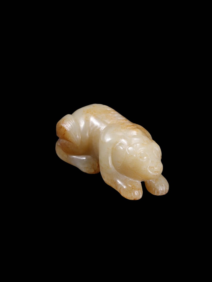 Mid-Qing Period White Hetian Jade Handpiece of Recumbent Auspicious Beast Naturally Permeated by (1 of 9)