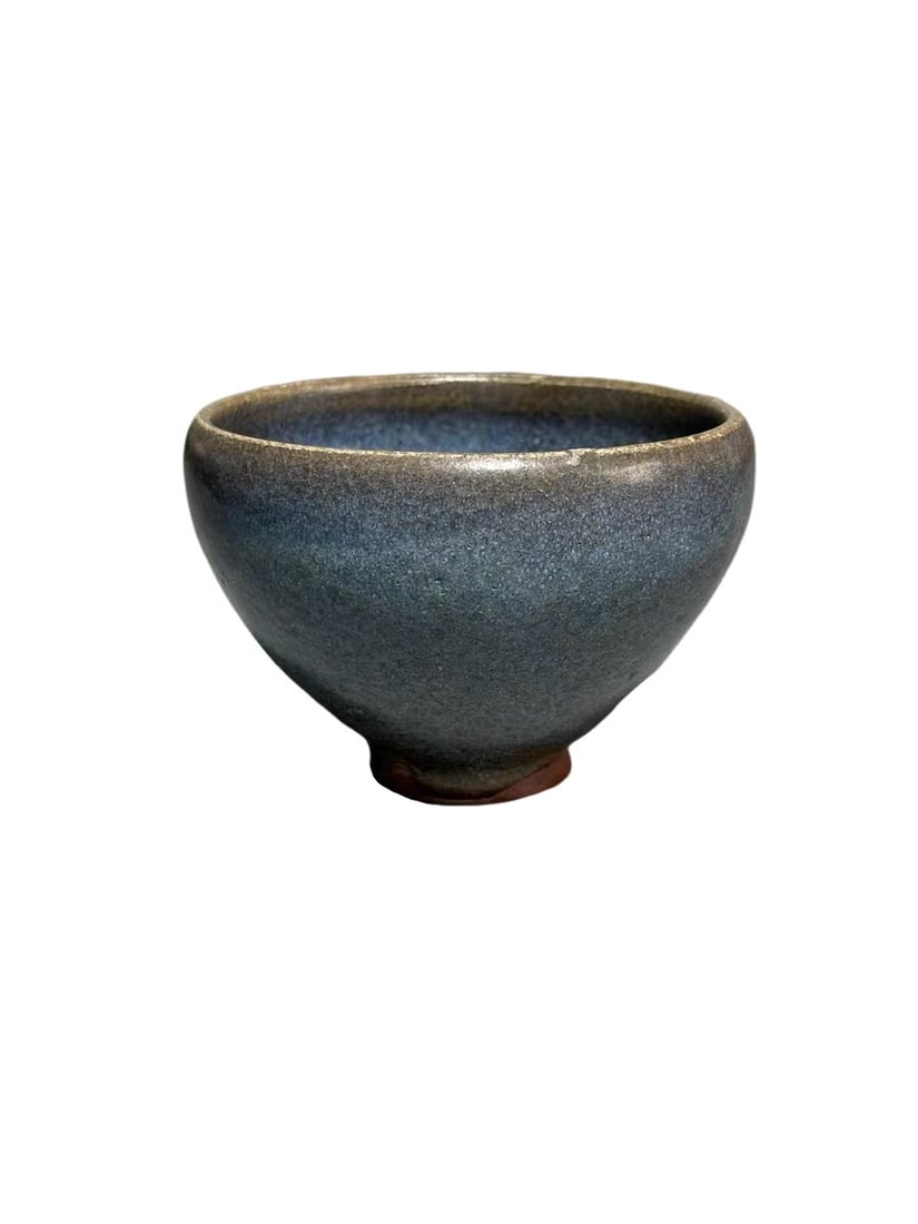Sky-Blue Glazed Deep-Bodied Jun Teacup with Bubble Texture: Sky-Blue Glazed Deep-Bodied Jun Teacup with Bubble TextureDimensionsMouth Diameter: approx. 8.5 cm (3.35 inches), Overall Height: approx. 6 cm (2.36 inches)General DescriptionThis artifact is a sky-bl