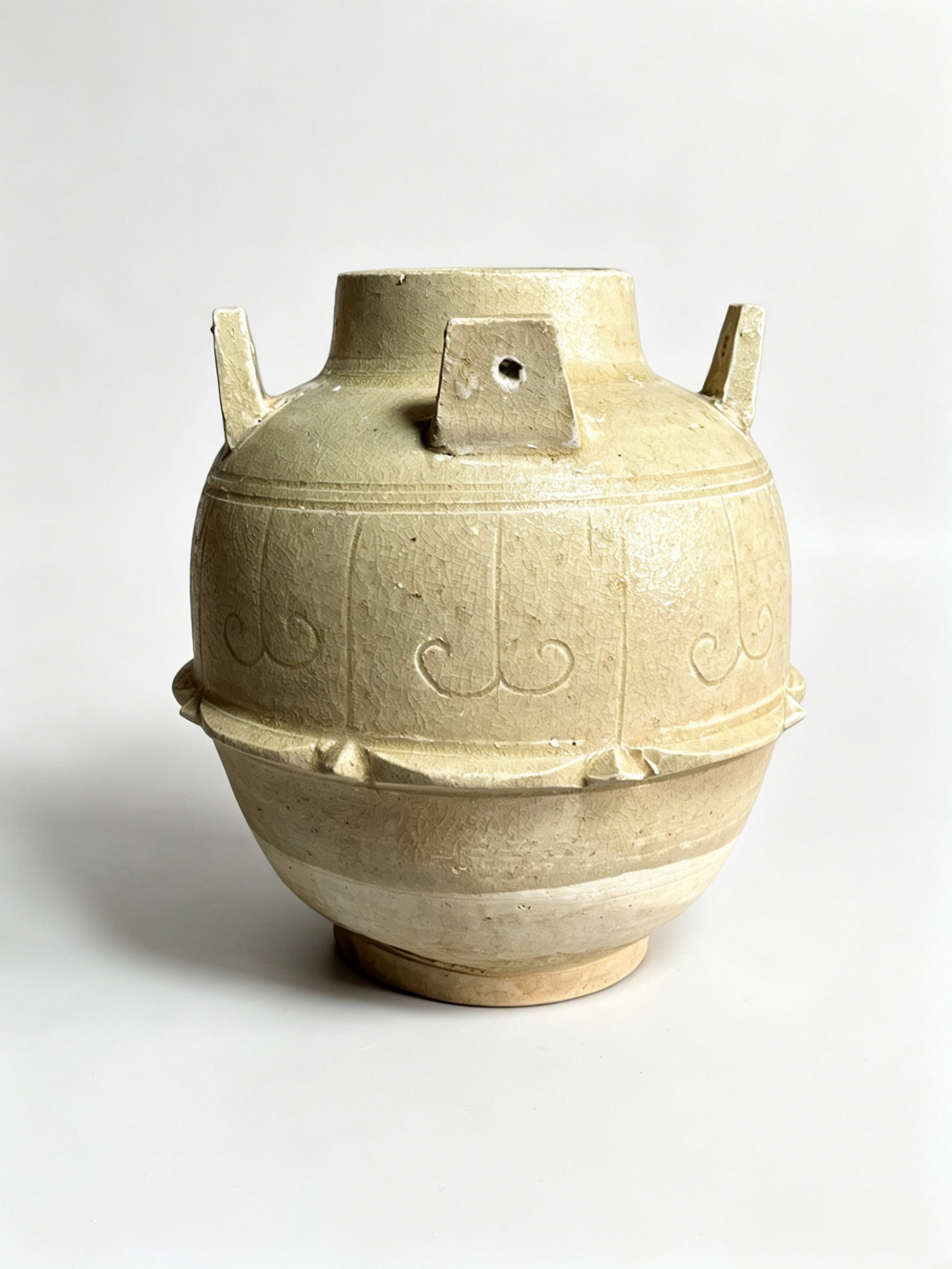 Four-Lug Storage Jar with Carved Scroll Grass and Moulded Lotus Petals, Celadon Glaze, Xiangzhou (1 of 8)