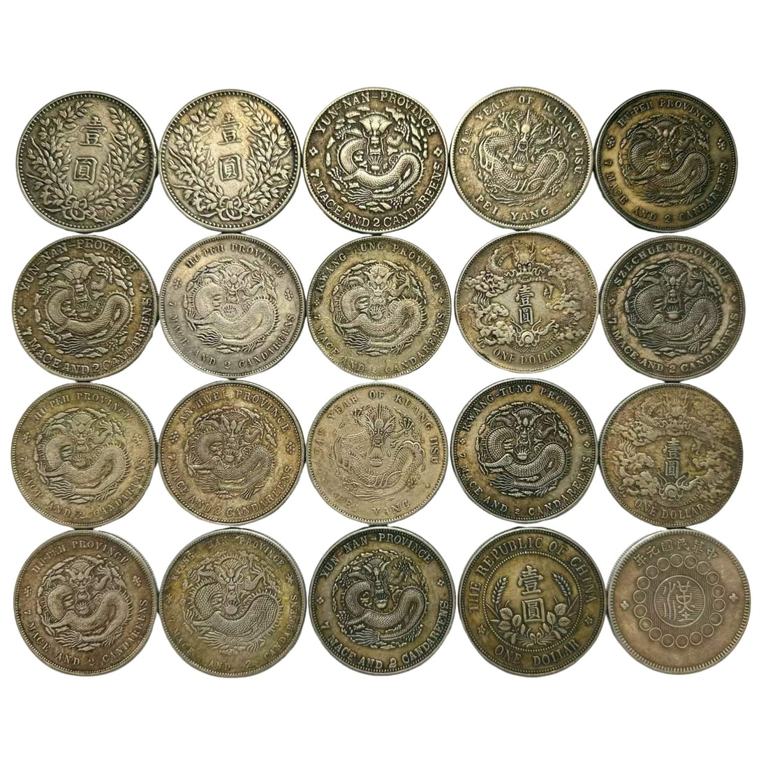 A Set of Twenty One-Yuan Machine-Struck Pure Silver Dollars, Qing to Republic of China Period: Dating Suggestion: Guangxu and Xuantong Reigns of the Qing Dynasty (1875–1912), Early Years of the Republic of China (1912–1930)Material: Standard fine silver machine-struck one-yuan silver coins 