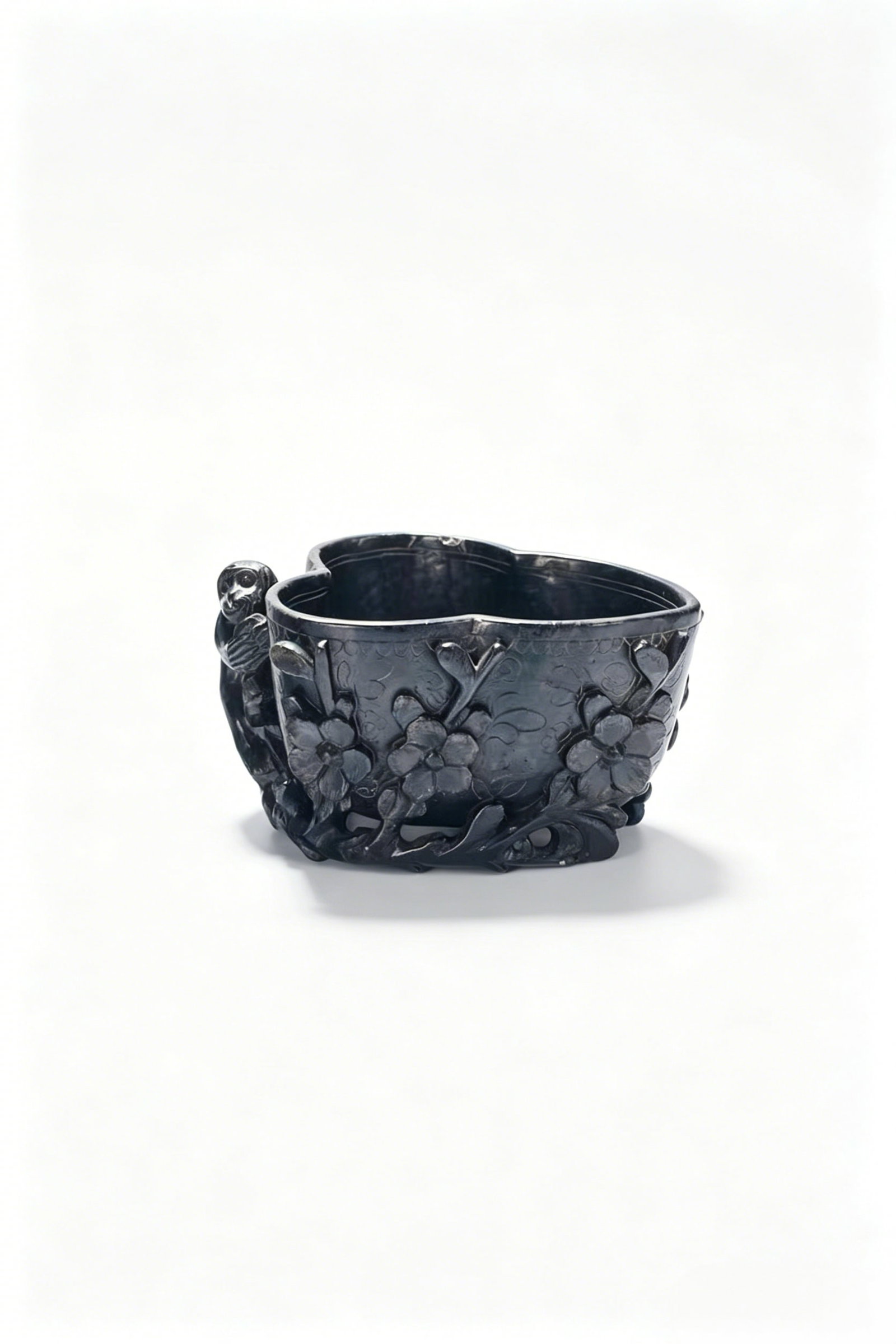 Song-Yuan Period Chu Stone Openwork Carved Cup in Plum Stump Peach Shape with Spirit Monkey Relief: Period: Song and Yuan Dynasties (Pre-Ming)Material: Natural Chu Stone (jet stone / black jasper, a rare ornamental stone for scholar’s studio wares in ancient times)Vessel Type: Bionic plum-stump pe
